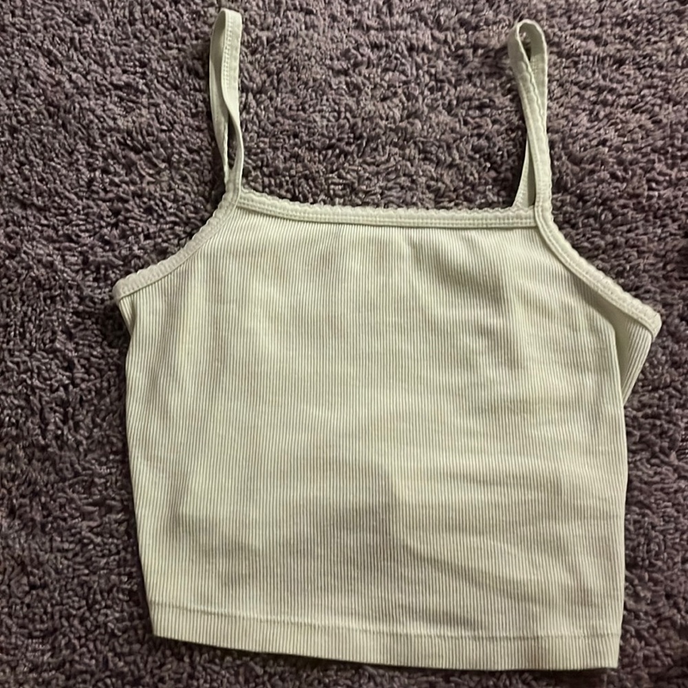 This is a cute light green crop top